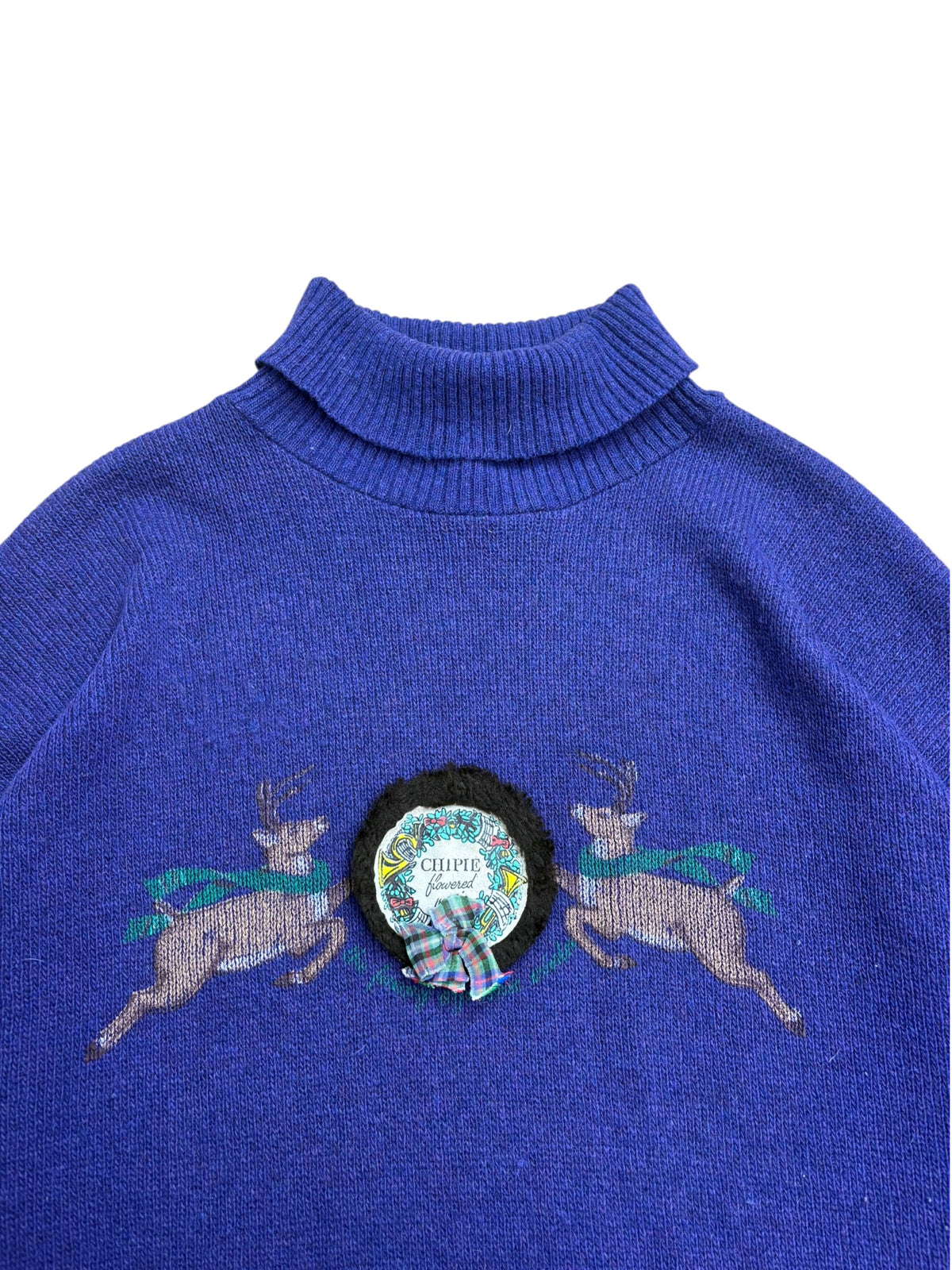 Chipie 80s Chest Motif Roll Neck Knit