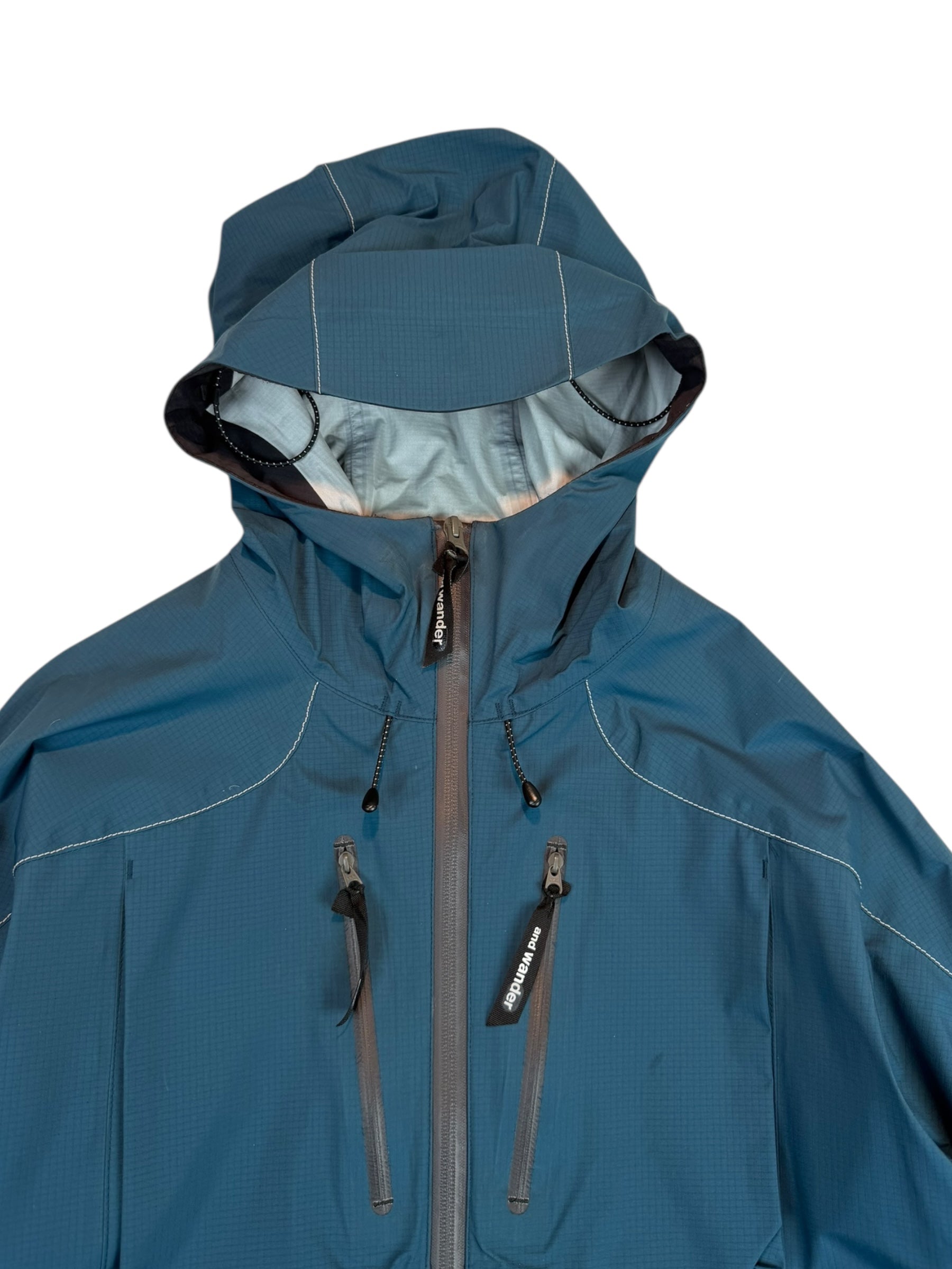 And Wander E Vent Dropping Pocket Rain Coat