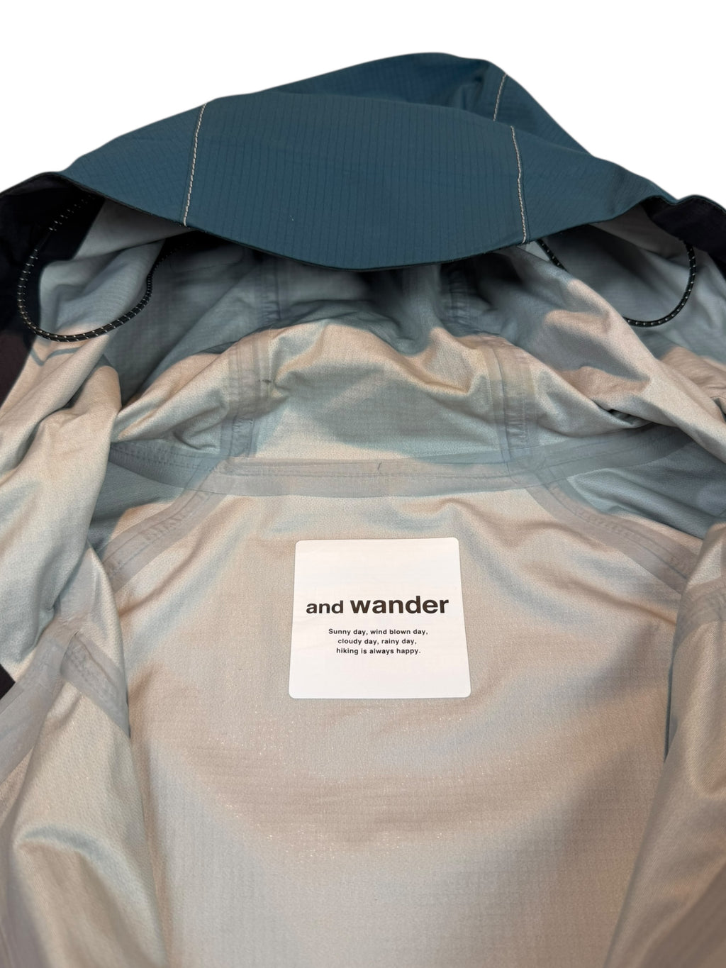 And Wander E Vent Dropping Pocket Rain Coat