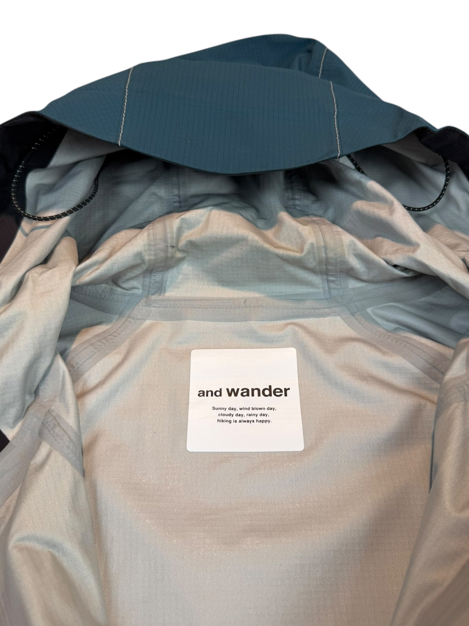 And Wander E Vent Dropping Pocket Rain Coat