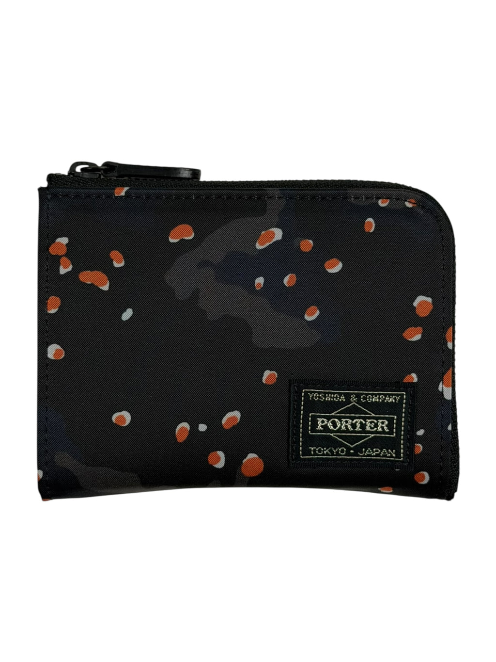 Black wallet with orange speckles and Porter Tokyo branding on a white background