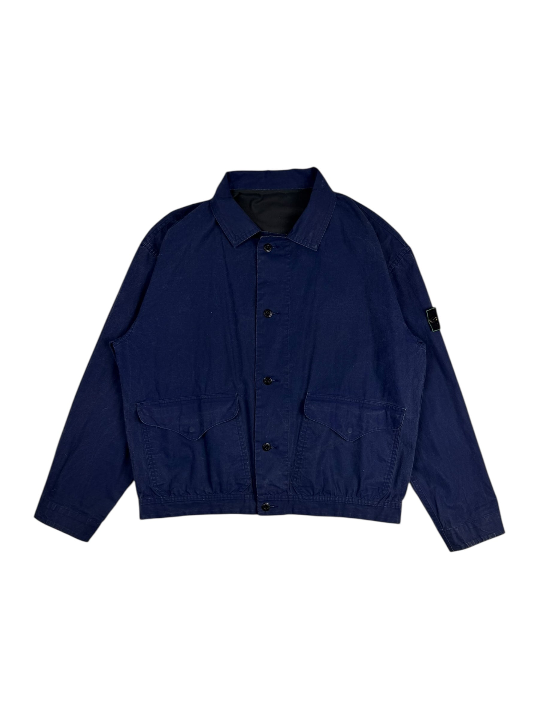 Navy blue jacket with button details on a white background